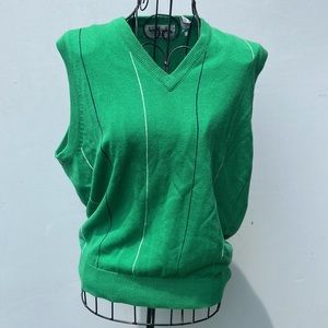 Green sweater vest by La Mode. Vintage v-neck vest